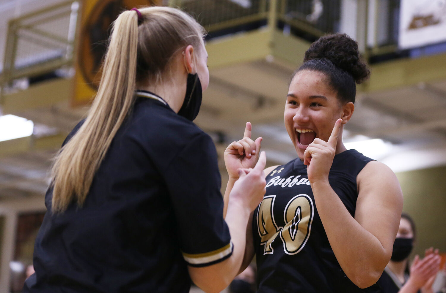 Danica Boyce holds up her finger guns with Cassie Downare
